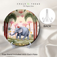 peaceful creamic elephant in garden hanging plates on wall