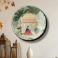 Woman sitting in cabana ceramic plates hanging on wall